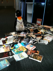 Pablo and books on floor