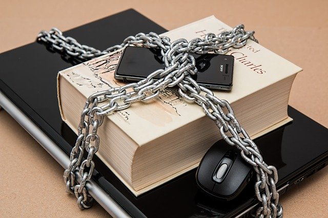 Secure your belonging - book, mobile phone and laptop chained together.