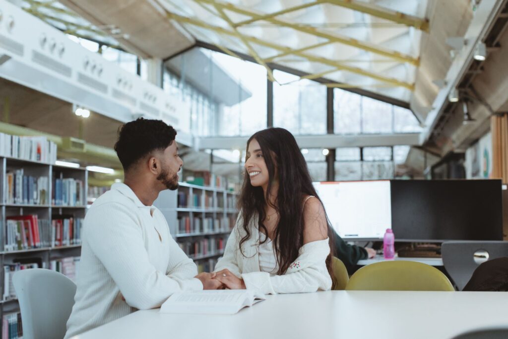 Tharsa Sakthipakan and Heshanth Muruganandan, now married, in the University Library shortly before their recent wedding.